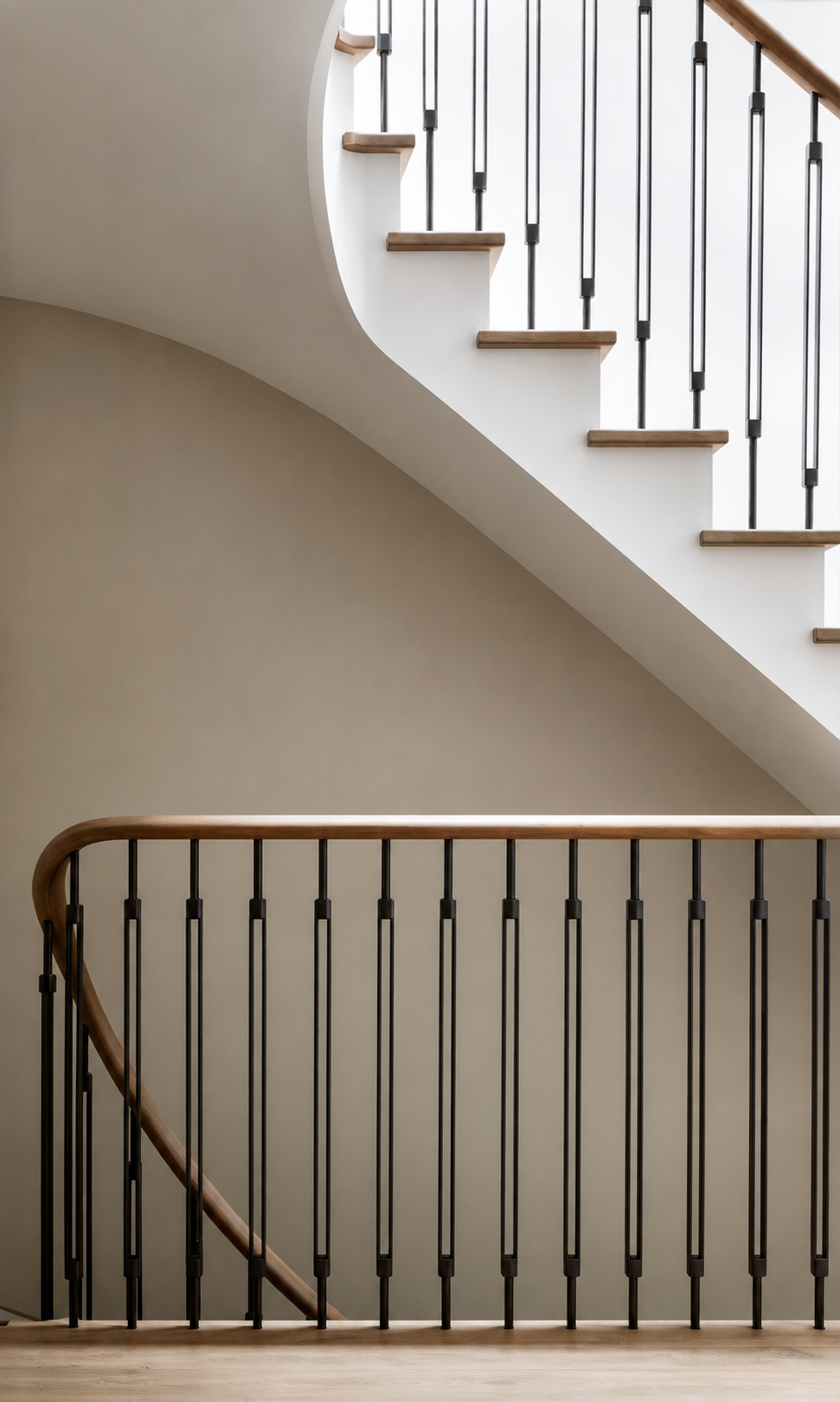 Modern vertical baluster staircase railing with timber handrail